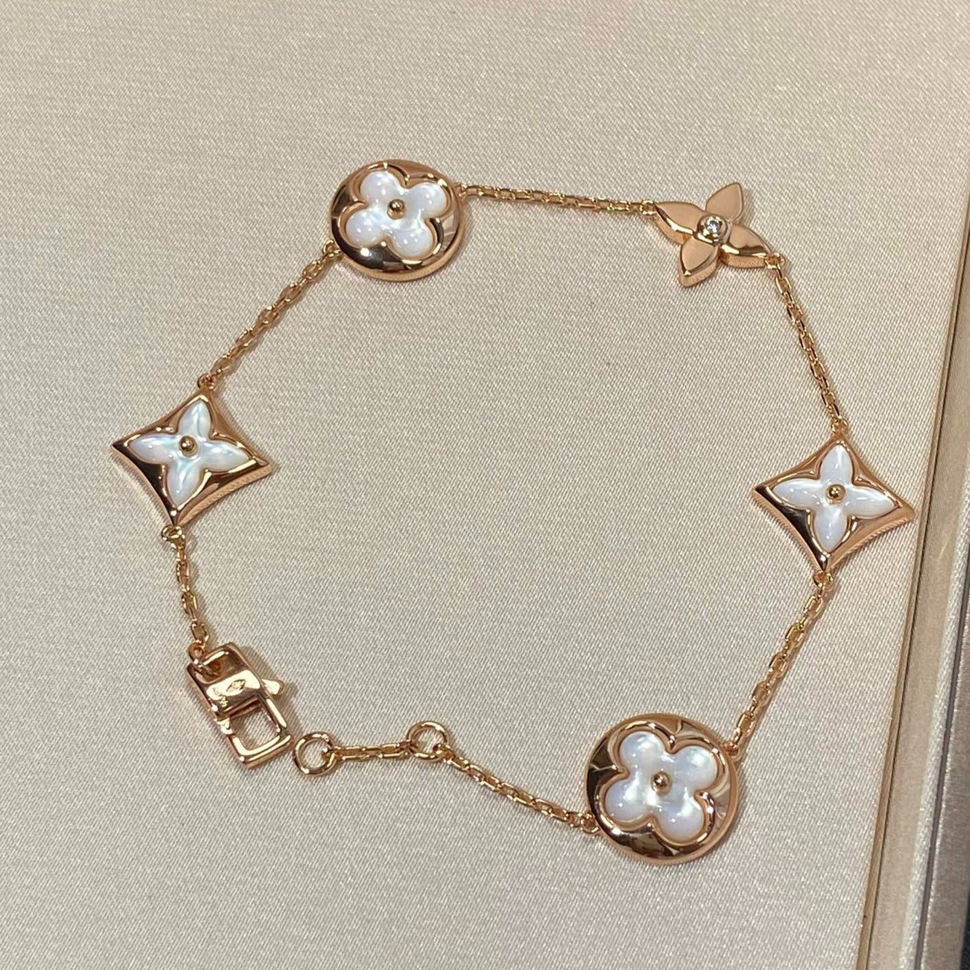 [LUXORA]STAR AND SUN 5 MOTIF MOP PINK GOLD BRACELET