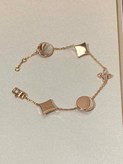 [LUXORA]STAR AND SUN 5 MOTIF MOP PINK GOLD BRACELET