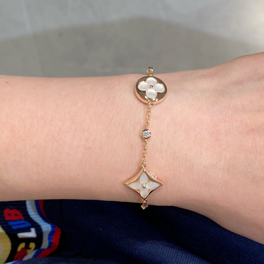 [LUXORA]STAR AND SUN 4 MOTIF WHITE MOP PINK GOLD BRACELET