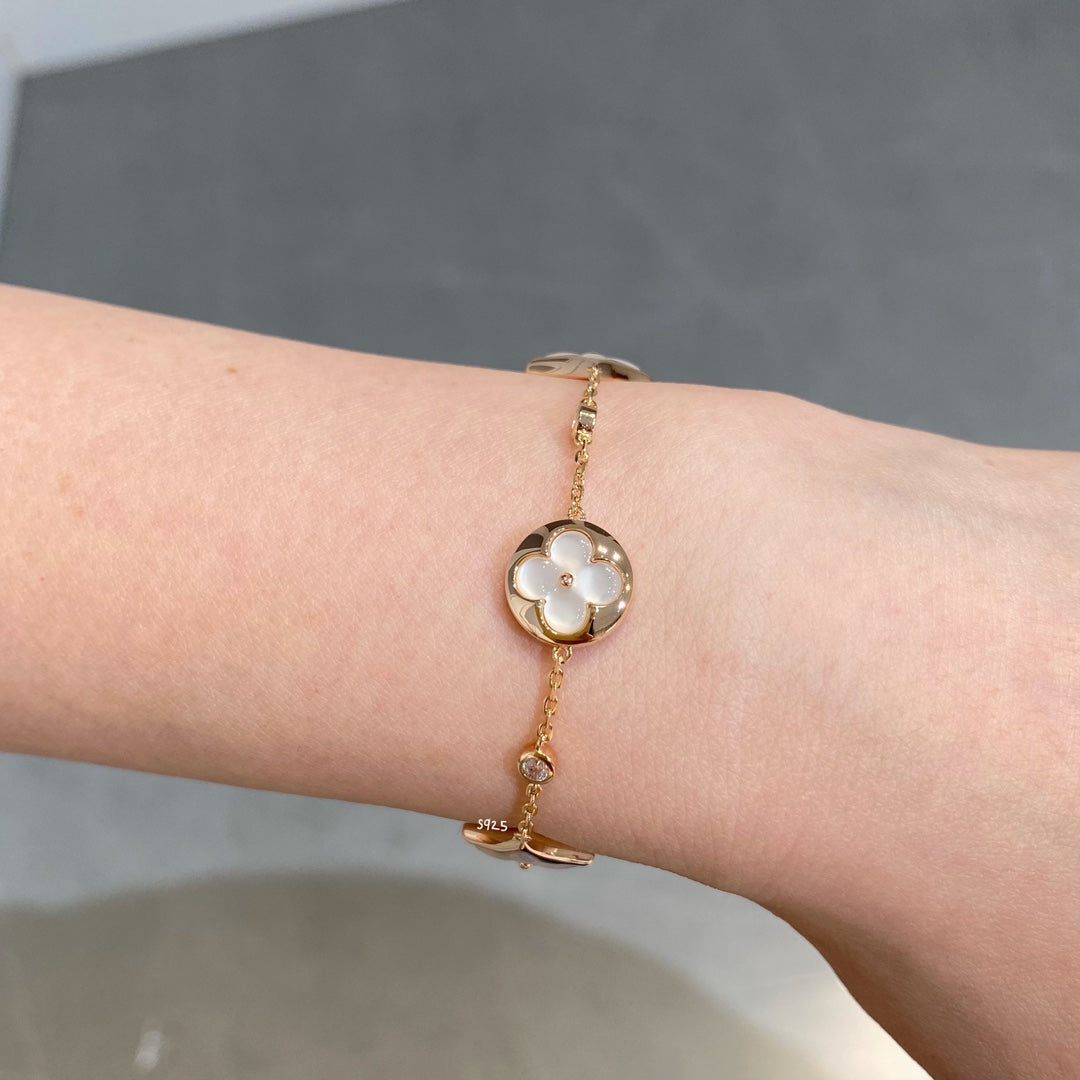 [LUXORA]STAR AND SUN 4 MOTIF WHITE MOP PINK GOLD BRACELET