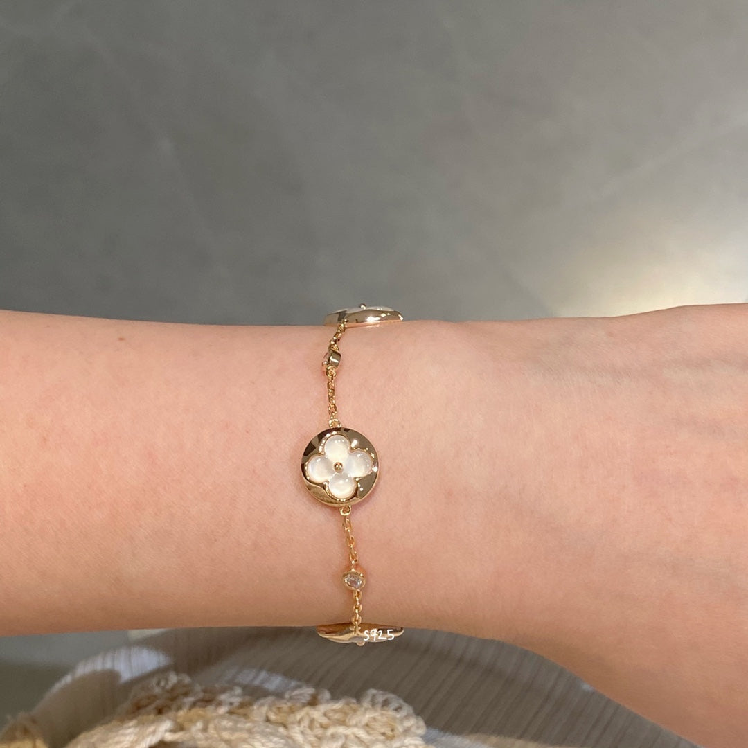 [LUXORA]STAR AND SUN 4 MOTIF WHITE MOP PINK GOLD BRACELET
