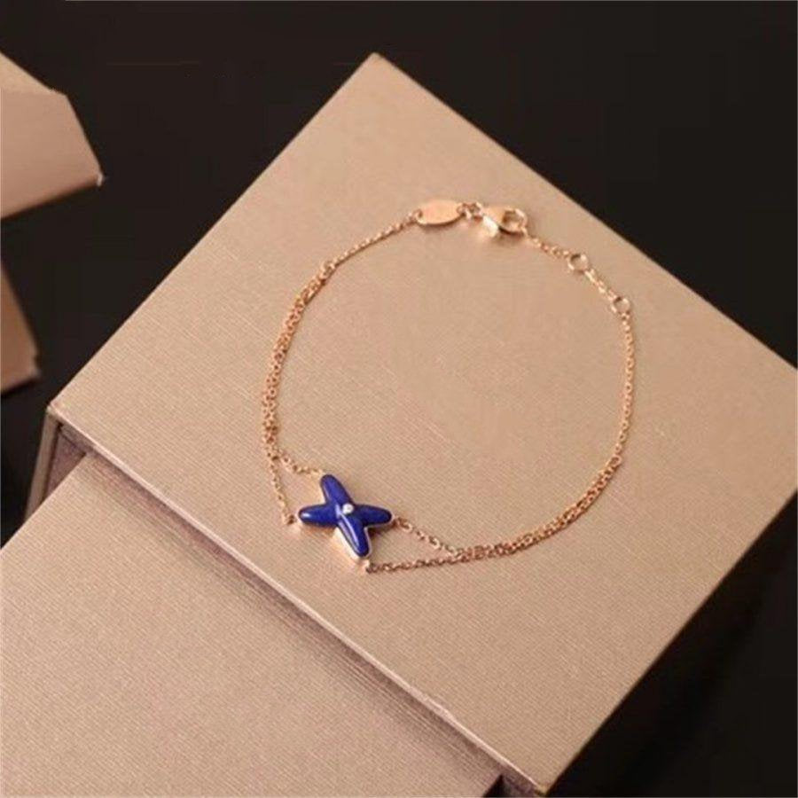 [LUXORA]Hollow Design Four-Leaf Clover Flower Shape Ring