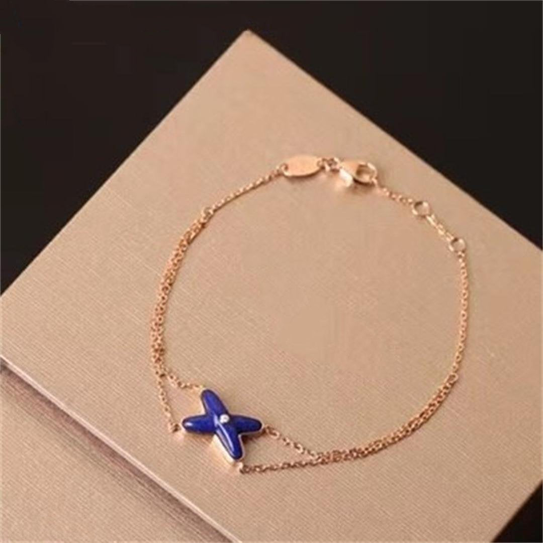 [LUXORA]Hollow Design Four-Leaf Clover Flower Shape Ring